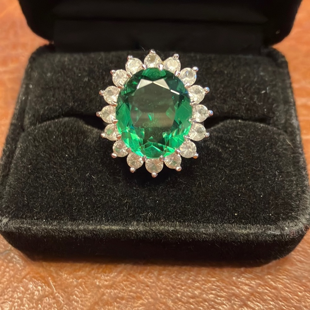 Cocktail ring that’s a size 6 3/4 Green and Clear Stones